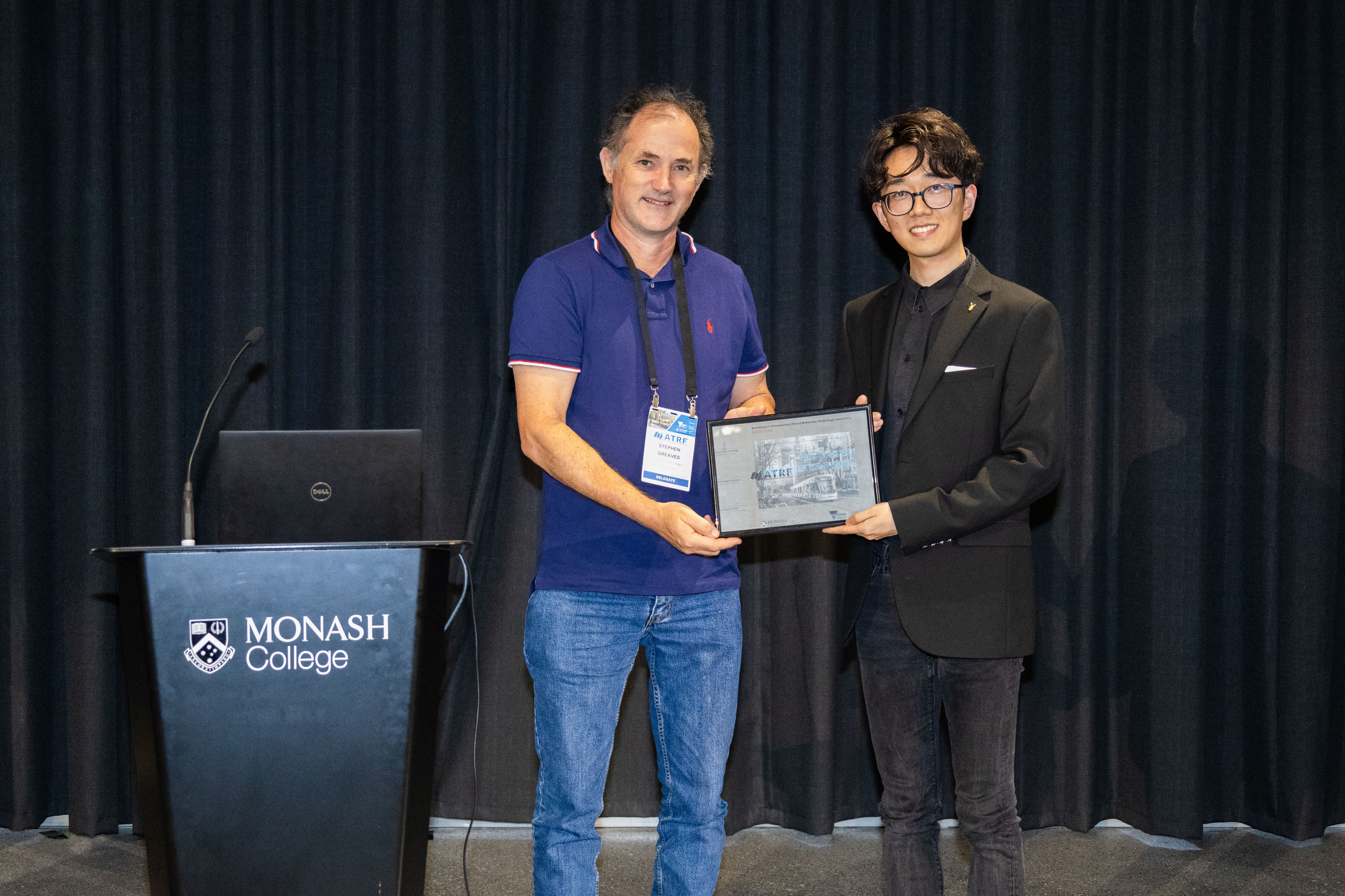 Lirui Guo receiving an award at ATRF 2024