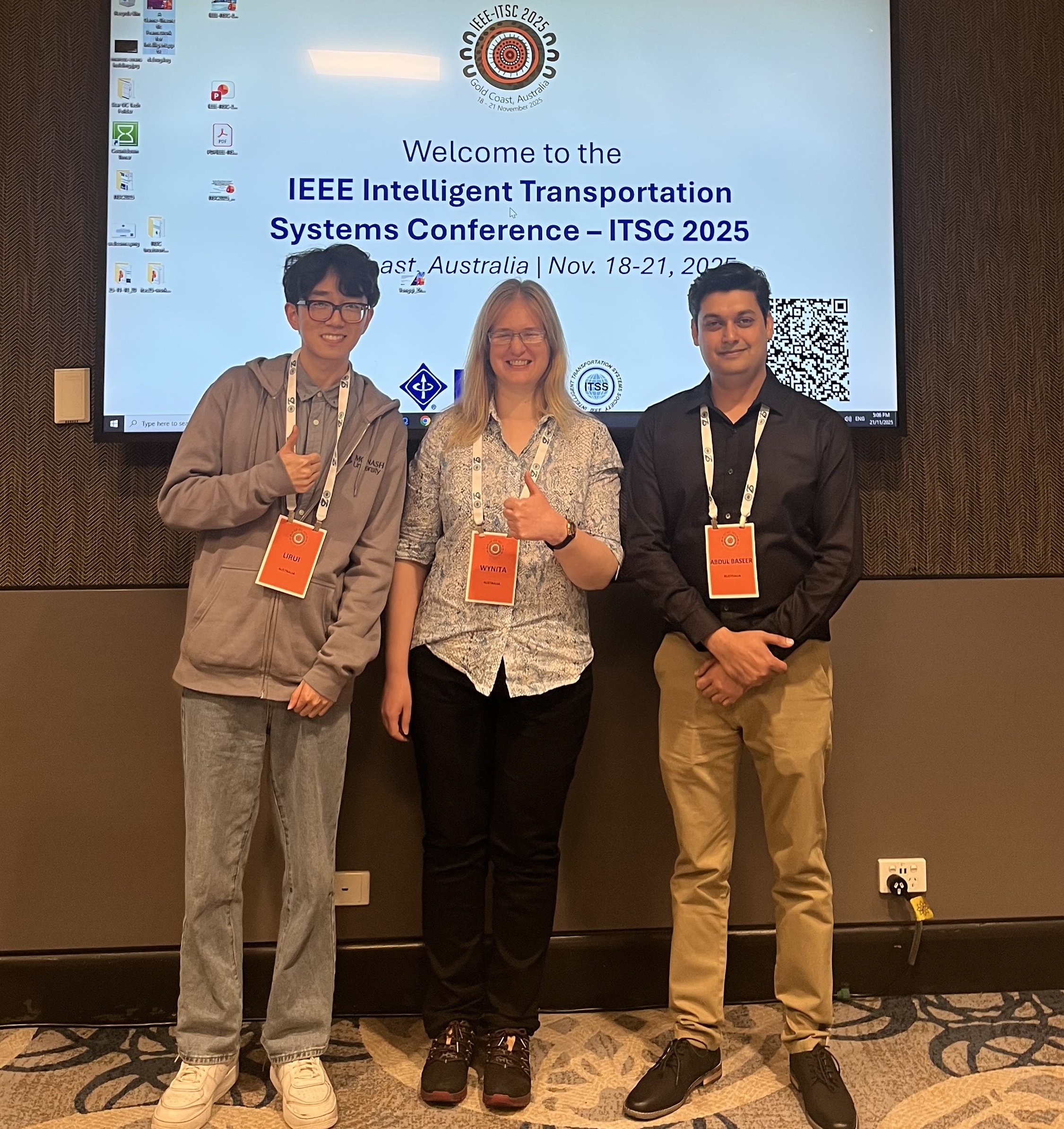 Lirui Guo with colleagues at IEEE ITSC 2025